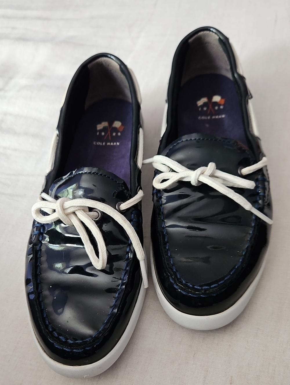 Cole Haan Navy Patent Loafers with White Laces